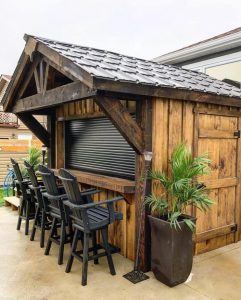 Pool bar with role up window and bar seats