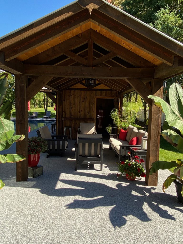 Pool bar with timber frame covered seating area