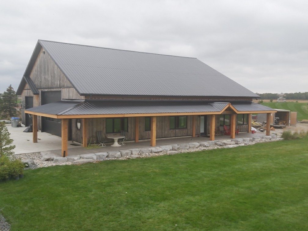 Timber frame veranda around farm building